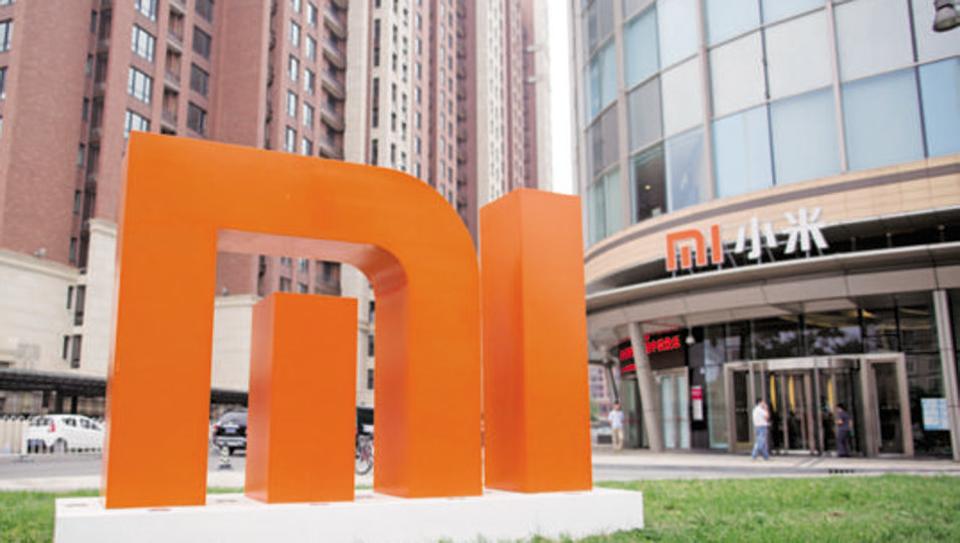 The Xiaomi Corp. logo stands outside the company