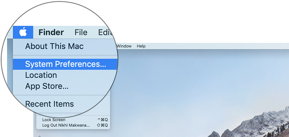 Klik Preferensi Sistem pada Mac