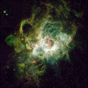 NGC 604, sebuah nebula besar yang terletak di galaksi spiral M33 yang berdekatan, di rasi bintang Triangulum