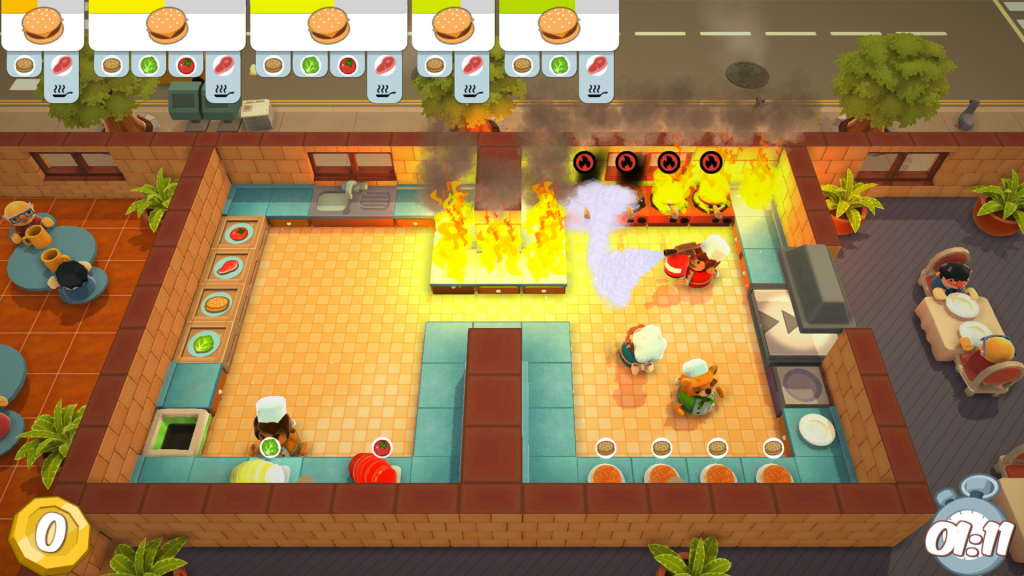 Pantalla de juego independiente Overcooked, donde un animal brillante ve una cocina con varios fuegos. 