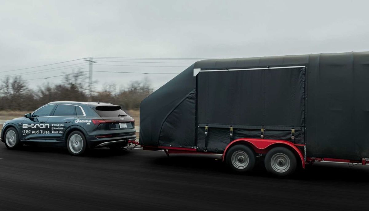 Audi e-tron pulls gm ev1 goes 500 miles price specs